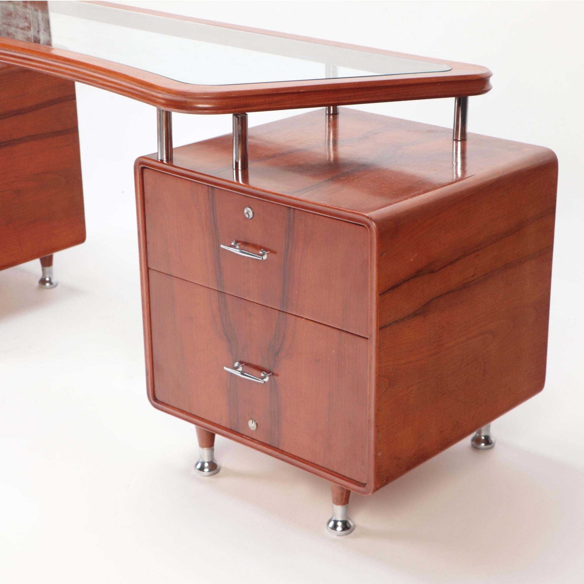 A Mid-Century Modern Double pedestal glass and wood Desk with chrome mounts C 1960. Three drawers on each side.
