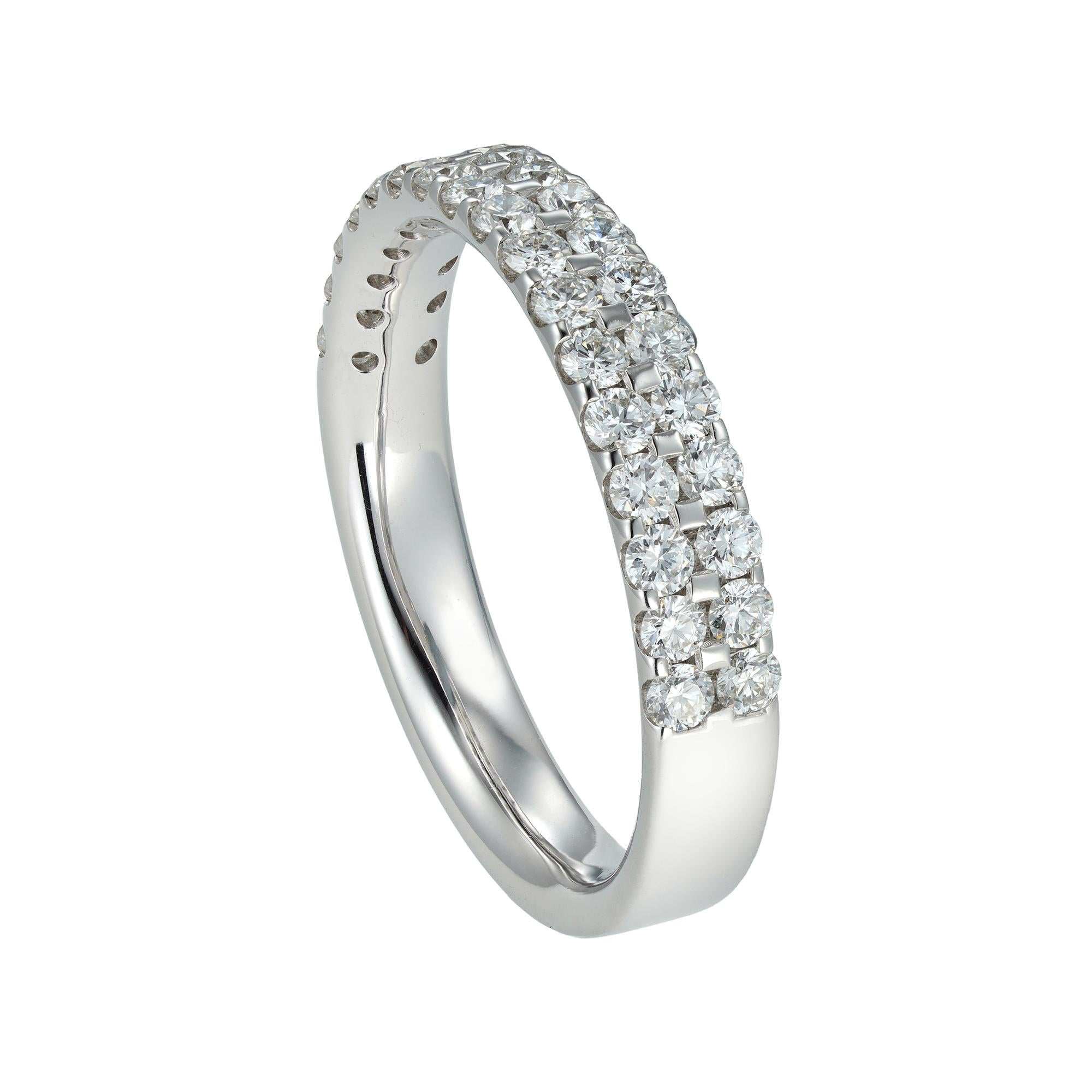 A double-row diamond half eternity ring, each row with seventeen round brilliant-cut diamonds, weighing 0.75 carats in total, claw-set in white gold mount, hallmarked 18ct gold, measuring 20 x 3.5mm, finger size M, gross weight 3.6 grams.

A bright