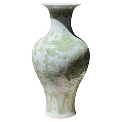 A dragon motif porcelain vase in seafoam by Tozai, 20th century