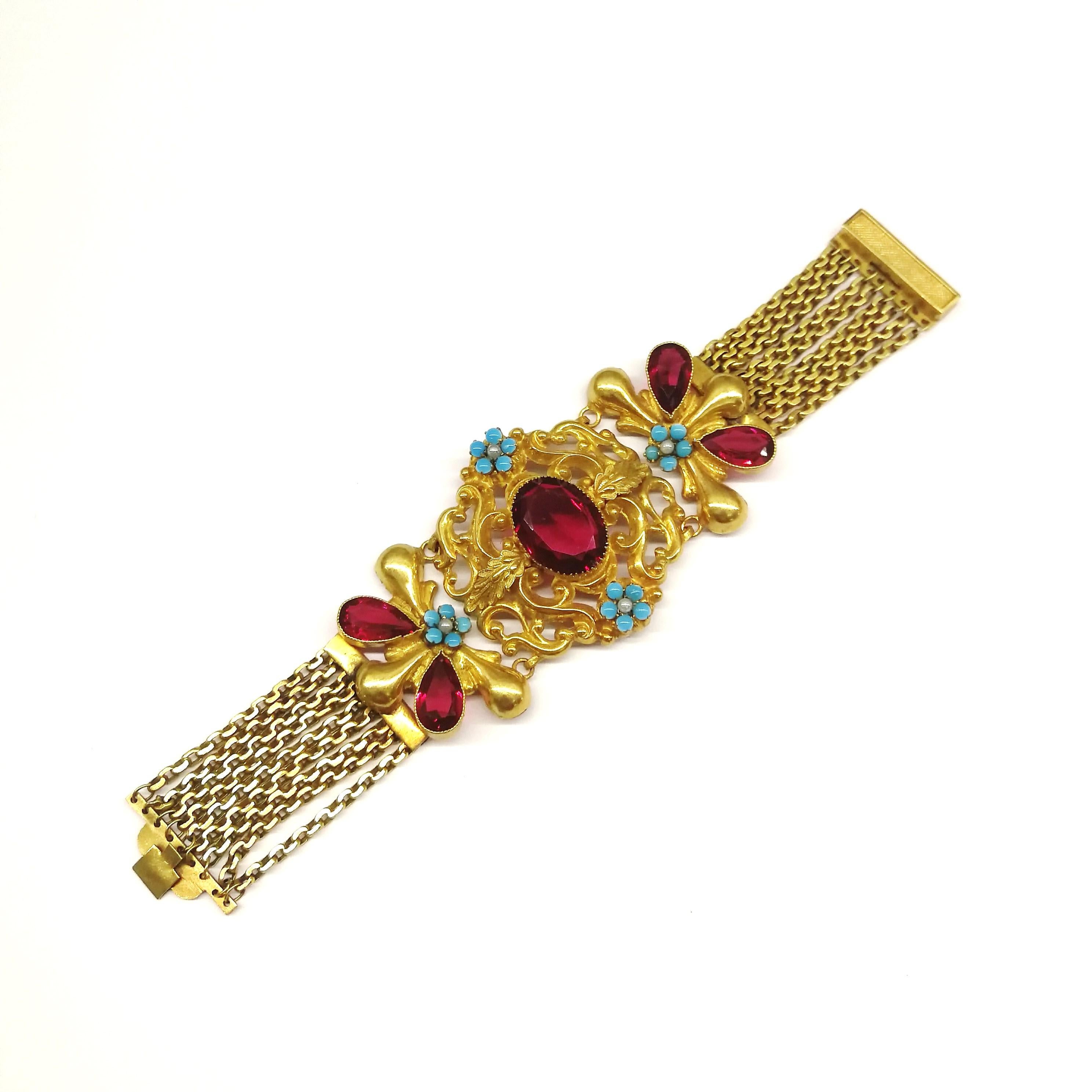 Victorian A dramatic wide gilt metal and paste bracelet, in a fitted box, c1900s