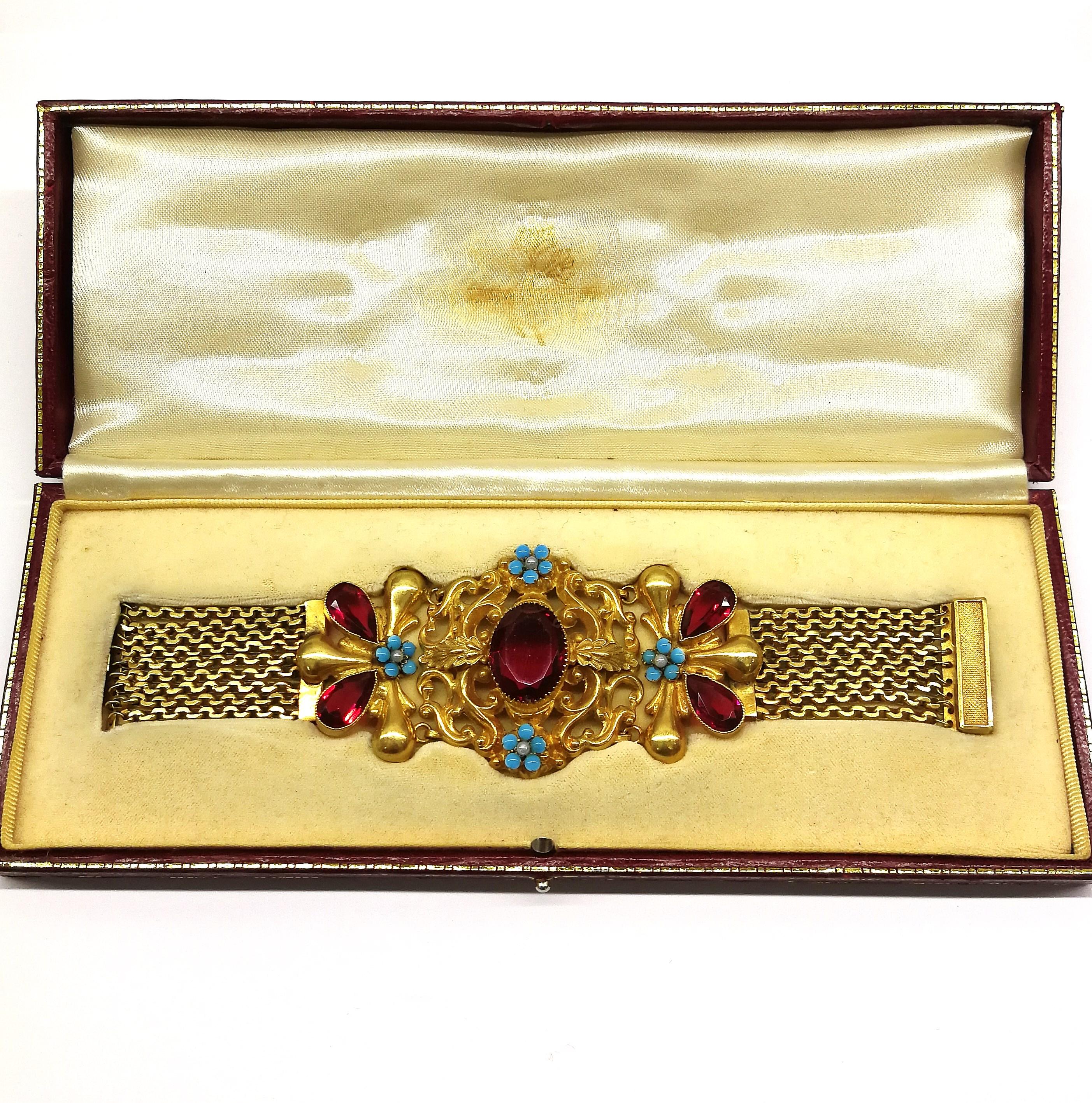 A dramatic wide gilt metal and paste bracelet, in a fitted box, c1900s 2