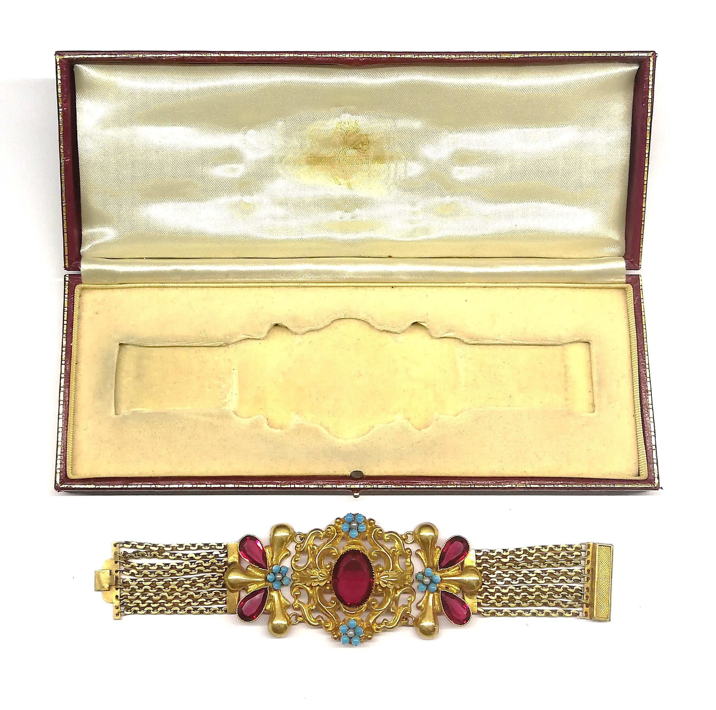 A dramatic wide gilt metal and paste bracelet, in a fitted box, c1900s 3