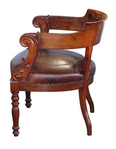 Dramatically-Carved French Restoration Mahogany Barrel-Back Desk Chair