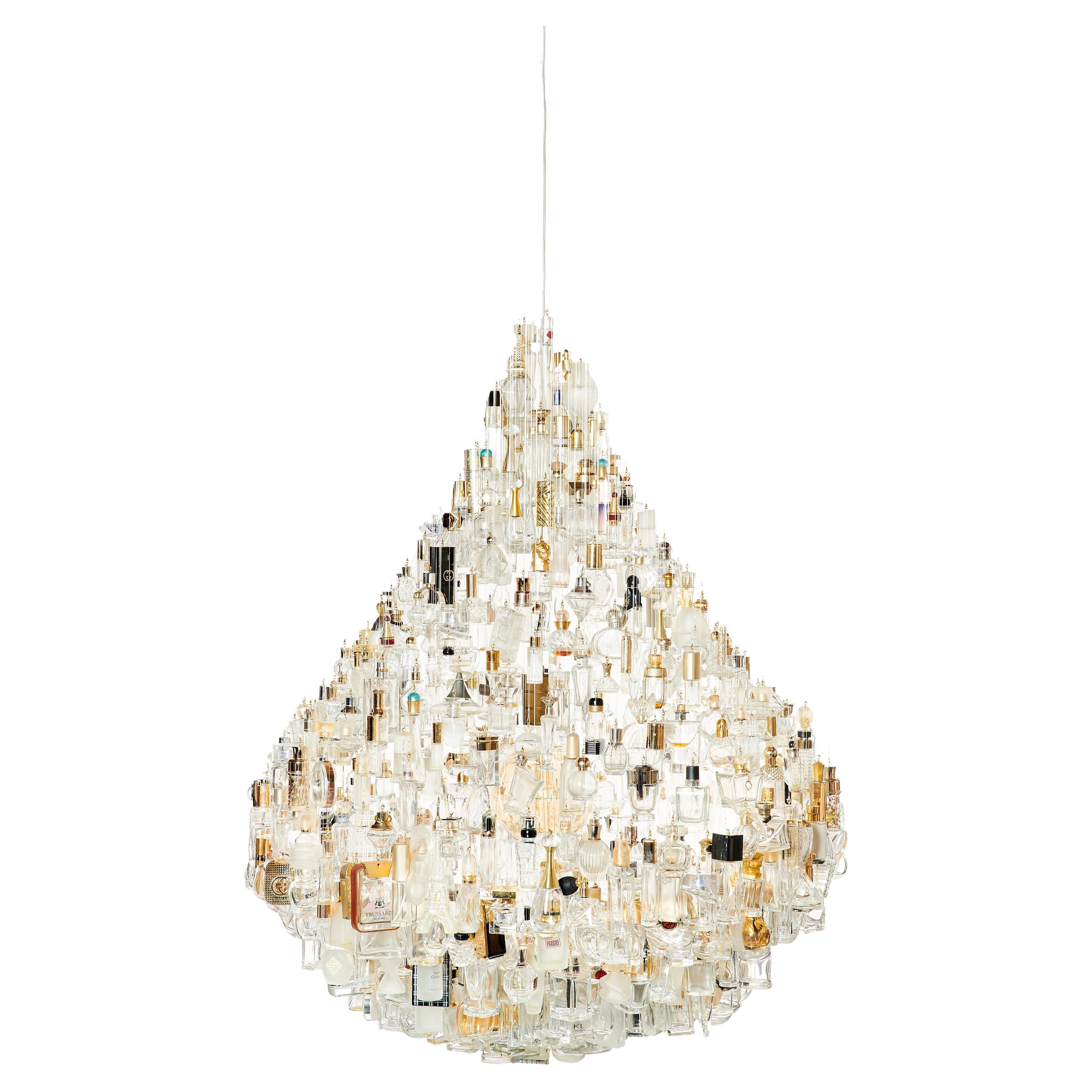 A drop of Essence 116 gold chandelier  For Sale