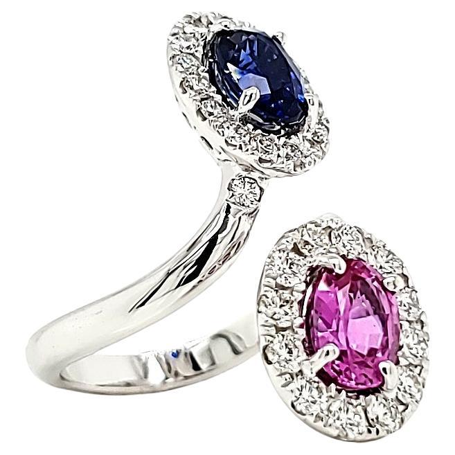A dual coloured ring of blue and pink sapphire intertwined 

His and hers two colour ring consisting of a pink and blue sapphire from Sri Lanka. They are perfectly matched and are intertwined together on a ring shank.

The blue represents the aura