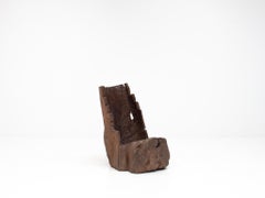 A Dug-out Carved Rustic Primitive Tree Trunk Fireside Chair Formed of Elm, c1800