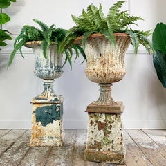 Duo of Early Victorian Cast Iron Urns on Plinths