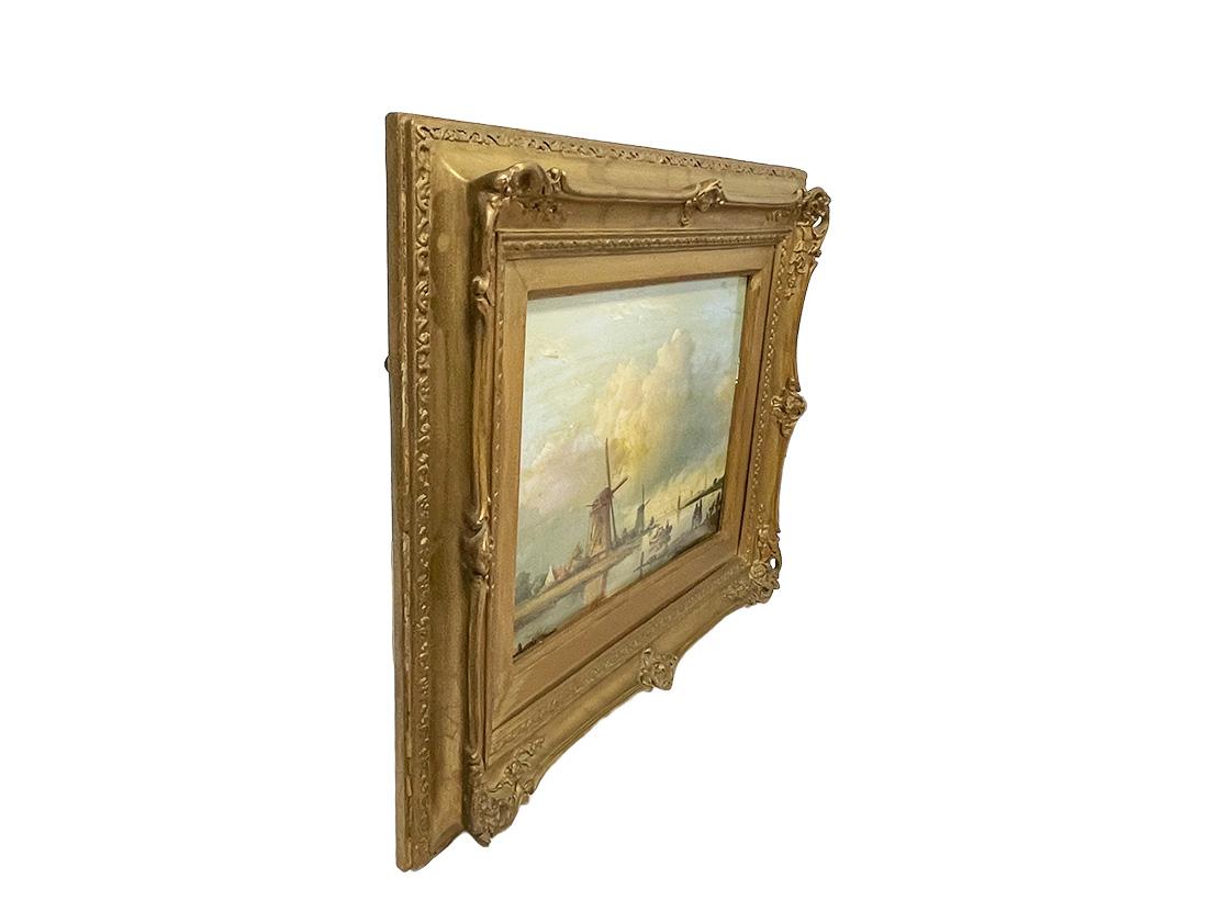 Un dipinto a olio su tavola olandese del XIX secolo.

Dipinto di scuola olandese (Hollandsche School), olio su tavola di Oak con una scena di paesaggio fluviale con mulini a vento e un paesaggio urbano in lontananza. Alcune persone in una barca e