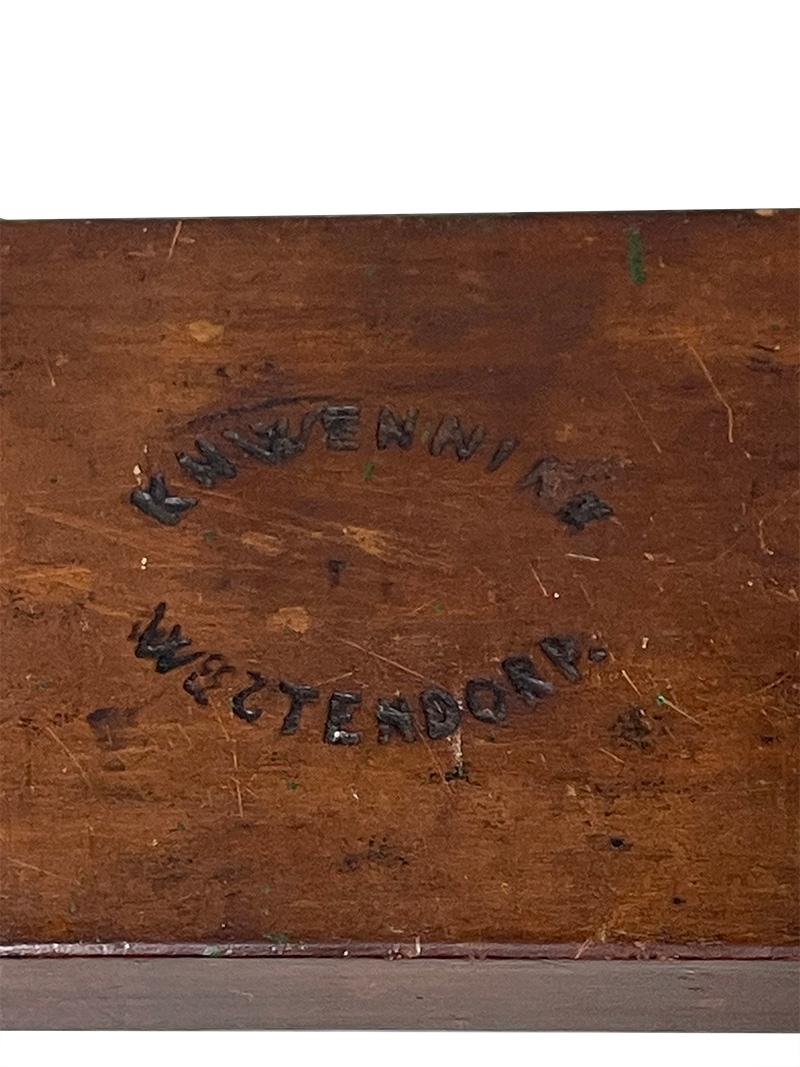 Moule à pain d'épices hollandais en bois du 19e siècle

Un moule en bois pour faire des biscuits en forme de couronnes royales, qui a été fabriqué par K.K. Wennink à Westendorp, boulanger de profession à la fin du 19e siècle. La planche était