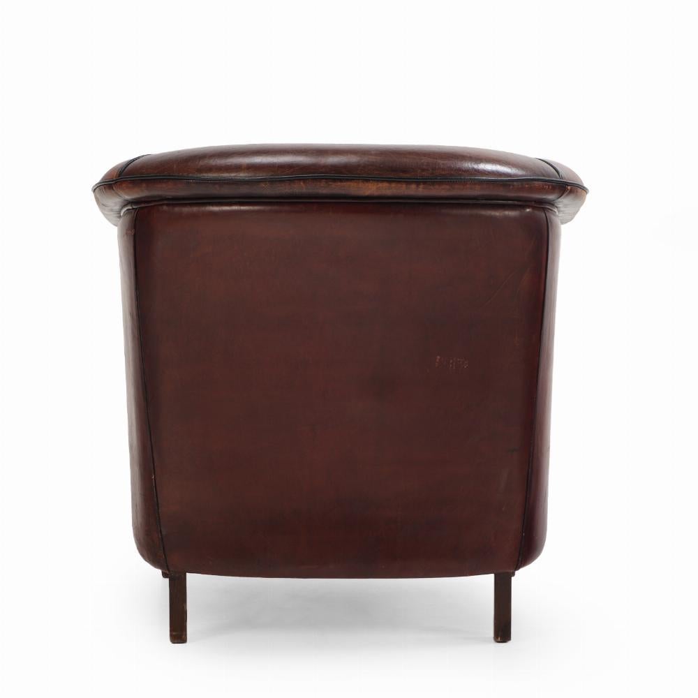 A Dutch Art Deco leather club chair, C 1940. In Good Condition For Sale In Philadelphia, PA