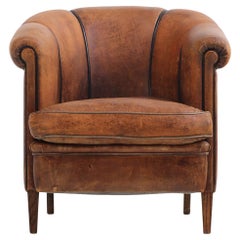 A Dutch Art Deco leather club chair, C 1940.