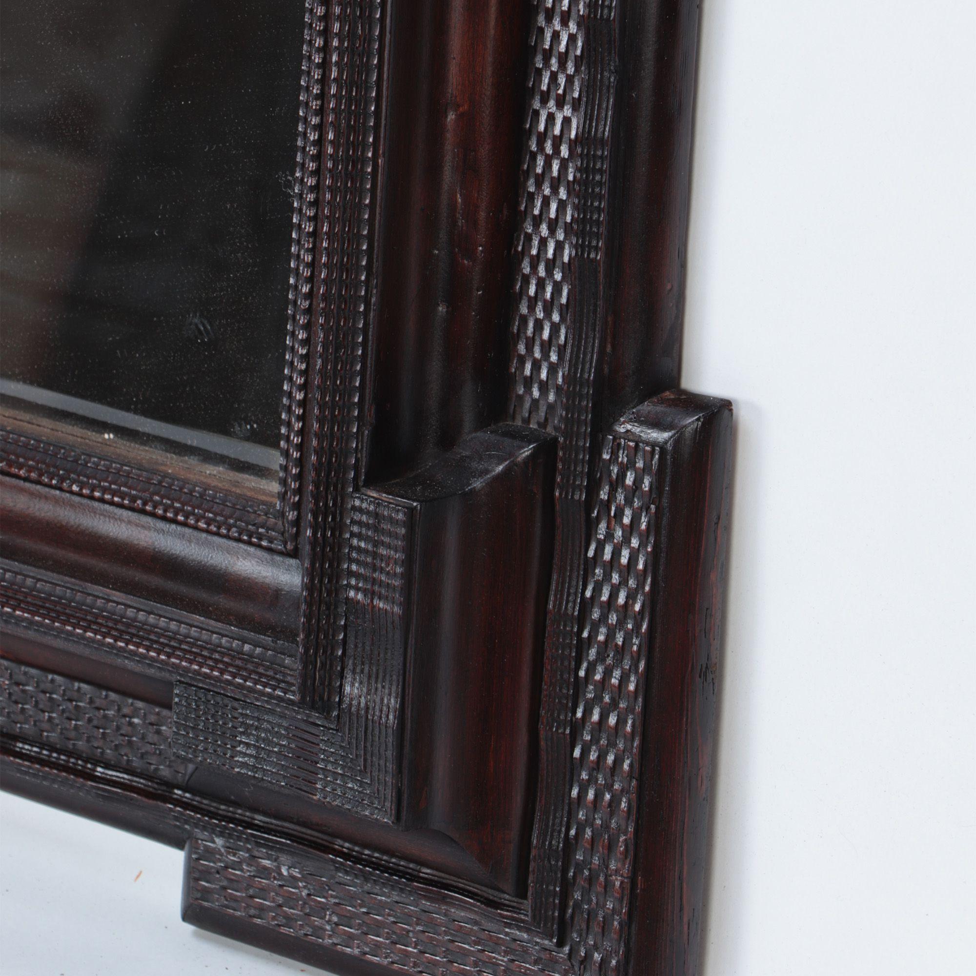 Dutch Blackened and Carved Wood Framed Mirror, 19th Century In Good Condition In Philadelphia, PA