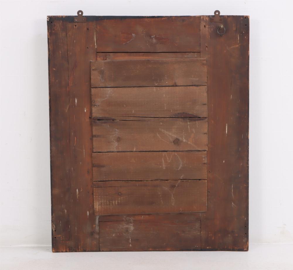 Ebonized A Dutch brass repousse mirror, 19th C.