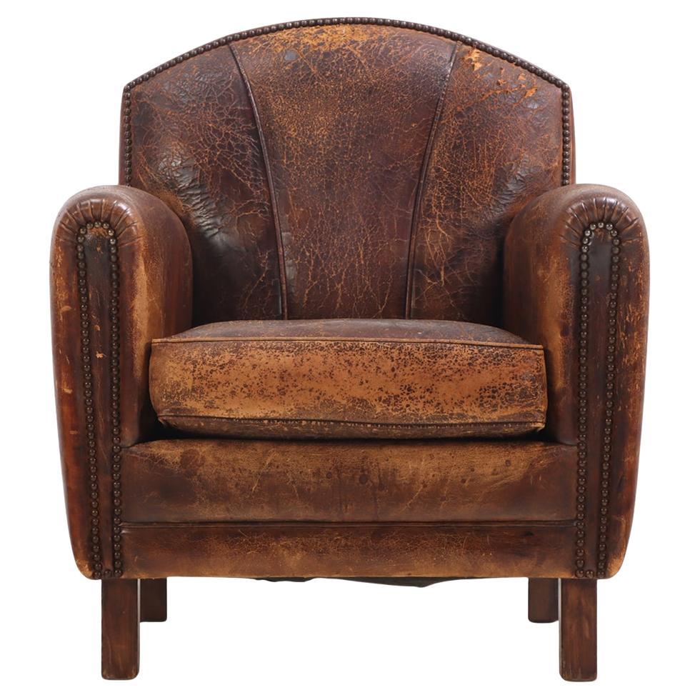 A.I.C., fauteuil club hollandais en cuir, C. 1950.