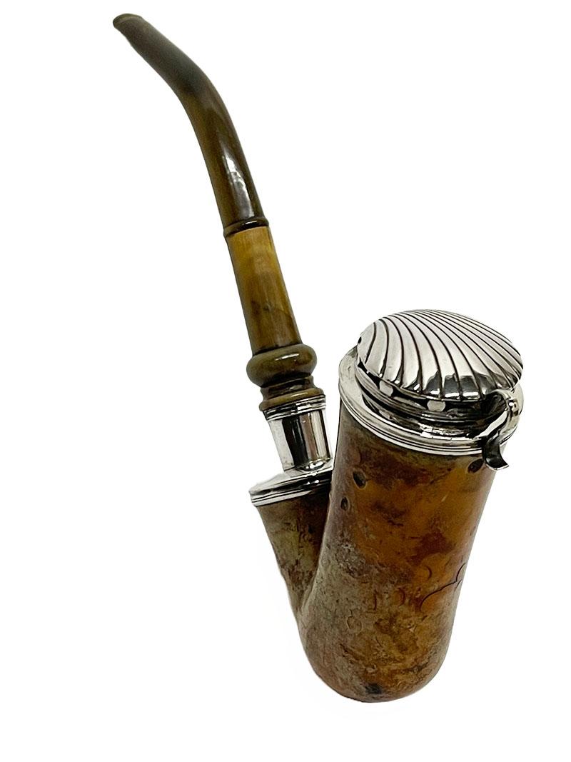 A Dutch meerschaum pipe with silver mounts, 1840-1870

According to common usage in the 19th century, the pipe bowl has a silver valve cover. The lid has a the pattern of a shell top and rests on several balls that ensure an equal air intake
