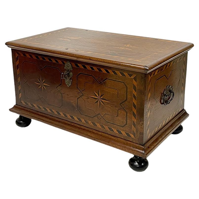 A Dutch Oak blanket chest with intarsia pigeon pattern, ca 1870-1890