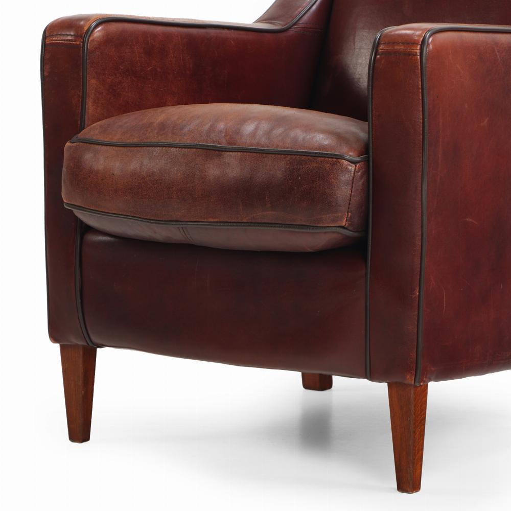 A Dutch pair of leather club chairs, C. 1960. In Good Condition For Sale In Philadelphia, PA