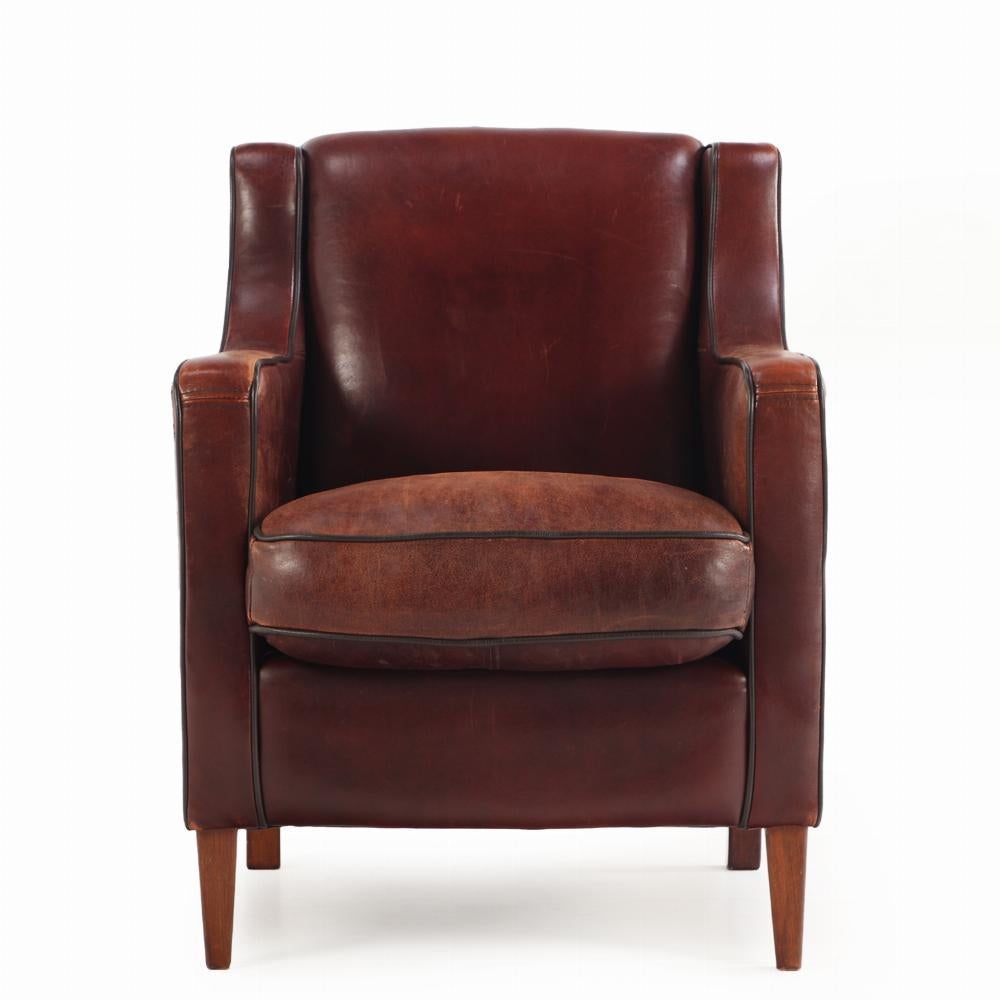 Leather A Dutch pair of leather club chairs, C. 1960. For Sale