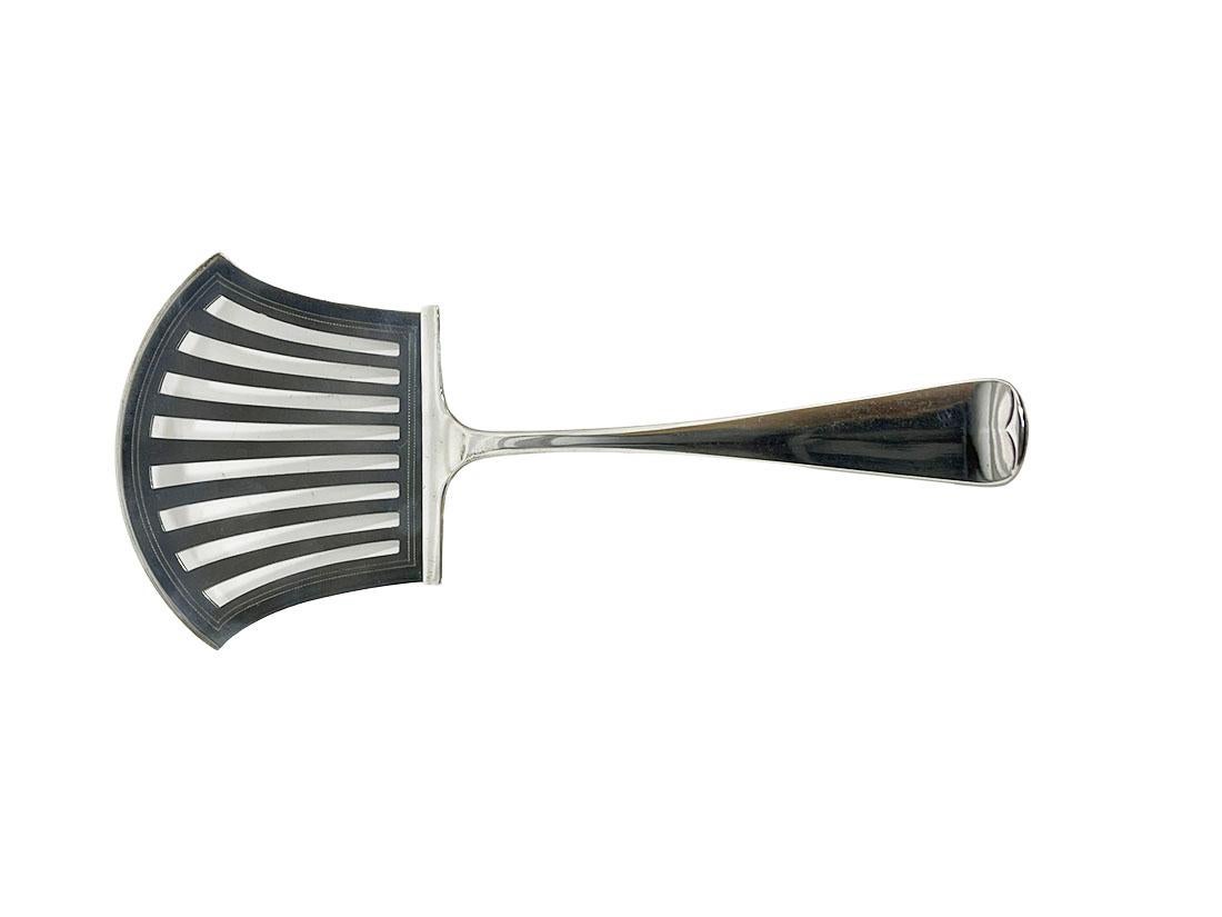 A Dutch silver asparagus tong by van Kempen & Sons, 1923

A Dutch silver asparagus tong, dated 1923, made by van Kempen & Sons (Fa. J.M. van Kempen & Sons) 1858-1924. The asparagus tong is marked with the Dutch silver hall mark 