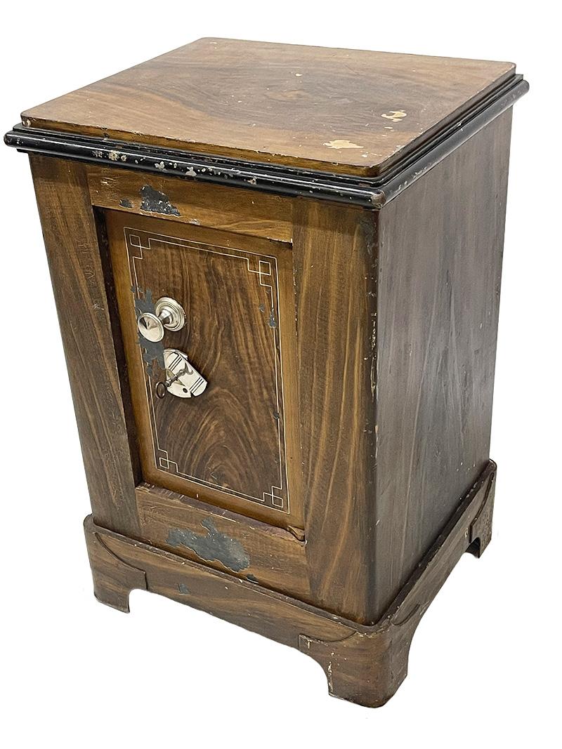 A Dutch steel painted wood look safe cabinet, ca. 1895

A safe made of steel, painted and represents a cabinet made of wood. This extremely heavy safe is opened by pressing and turning the key, allowing the extremely heavy door to be opened. The