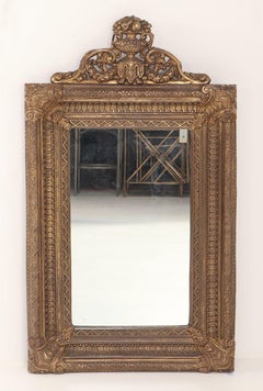 A Dutch style brass repouse mirror circa 1880. Top crest is removeable