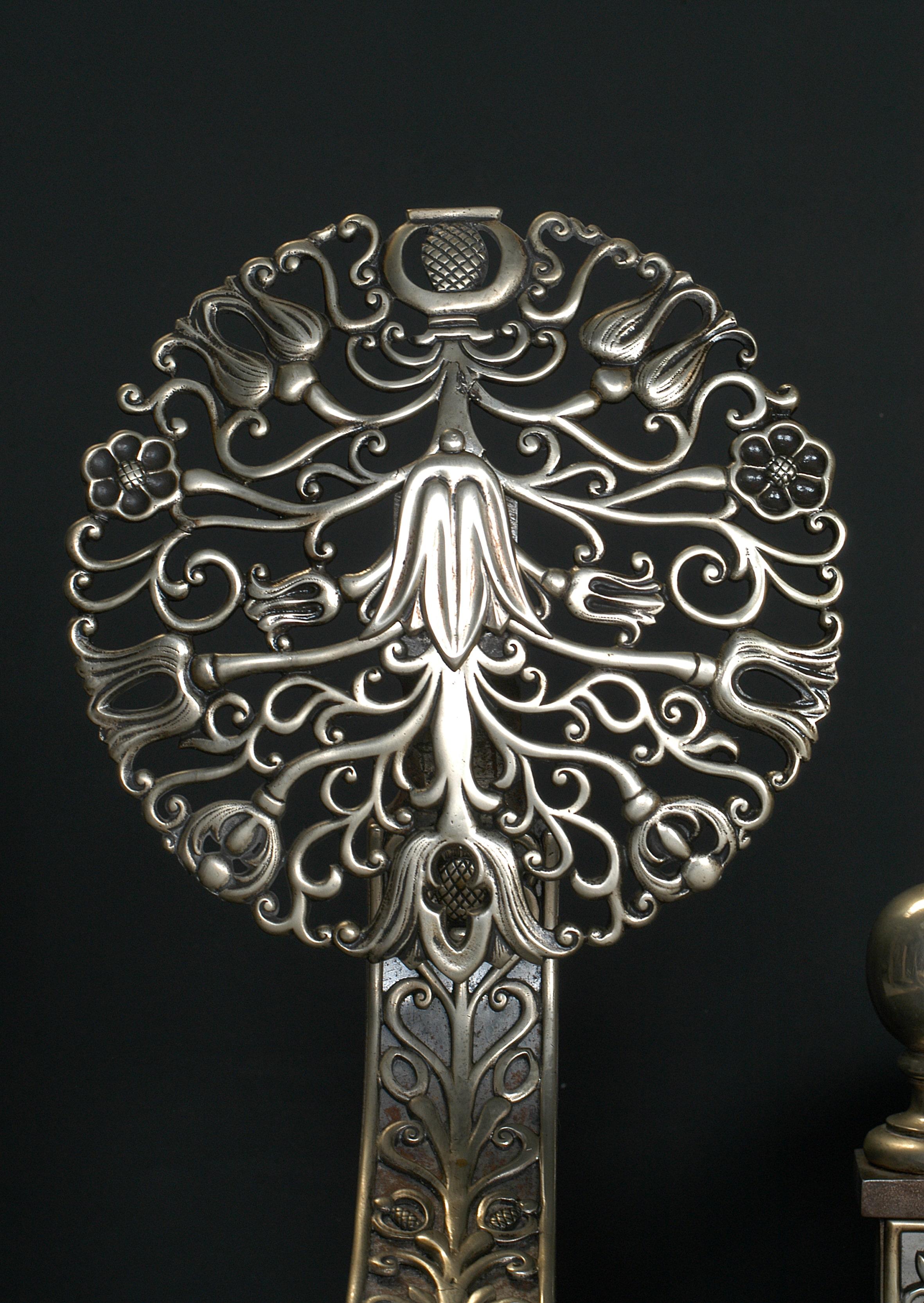 A very important early 19th century English nickel and cast iron firegrate, with the dogs comprising beautifully pierced rosettes of bellflowers and scrolls, and ornately cast supports.

Width At Front:	1410 mm      	55 ½
