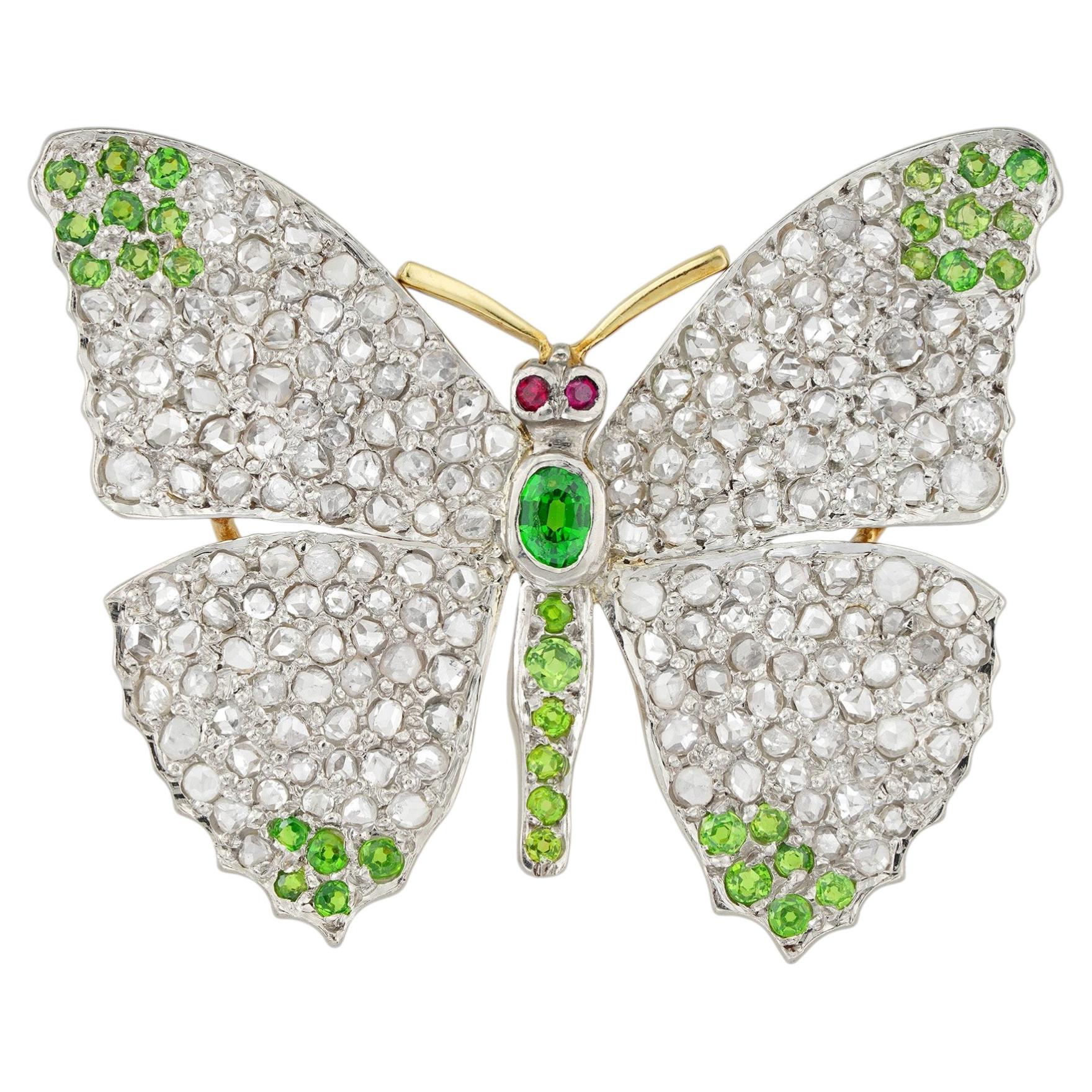 A Edwardian diamond and demantoid garnet butterfly brooch