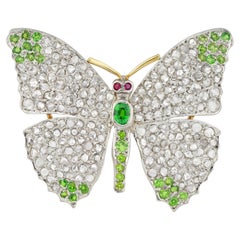 A Edwardian diamond and demantoid garnet butterfly brooch