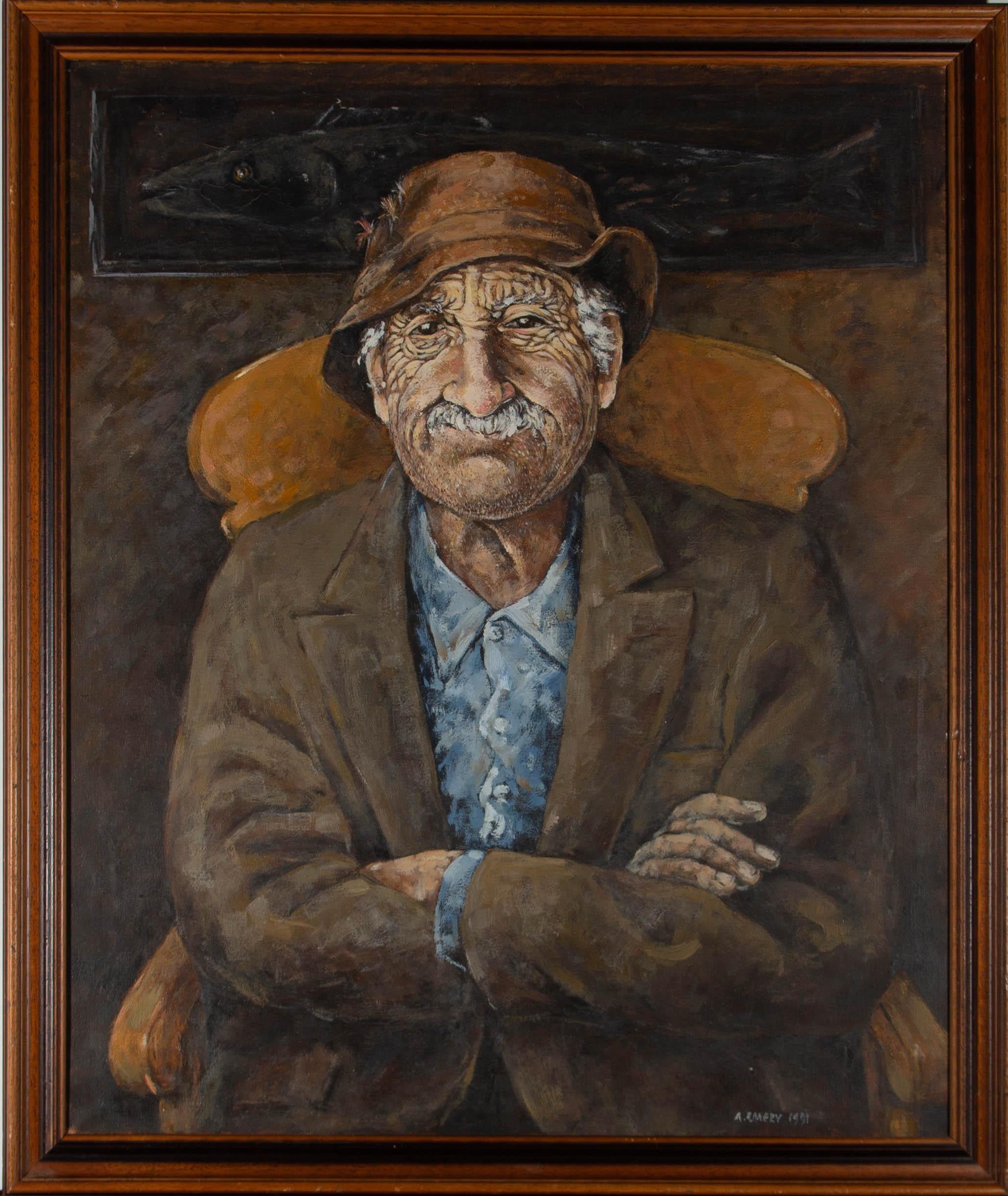 A charming oil portrait showing a very pleased looking fisherman with ample stubble. A large fish is mounted on the wall behind him as he sits in front of it, wide grin and arms folded. The artist has signed and dated to the lower right corner. The