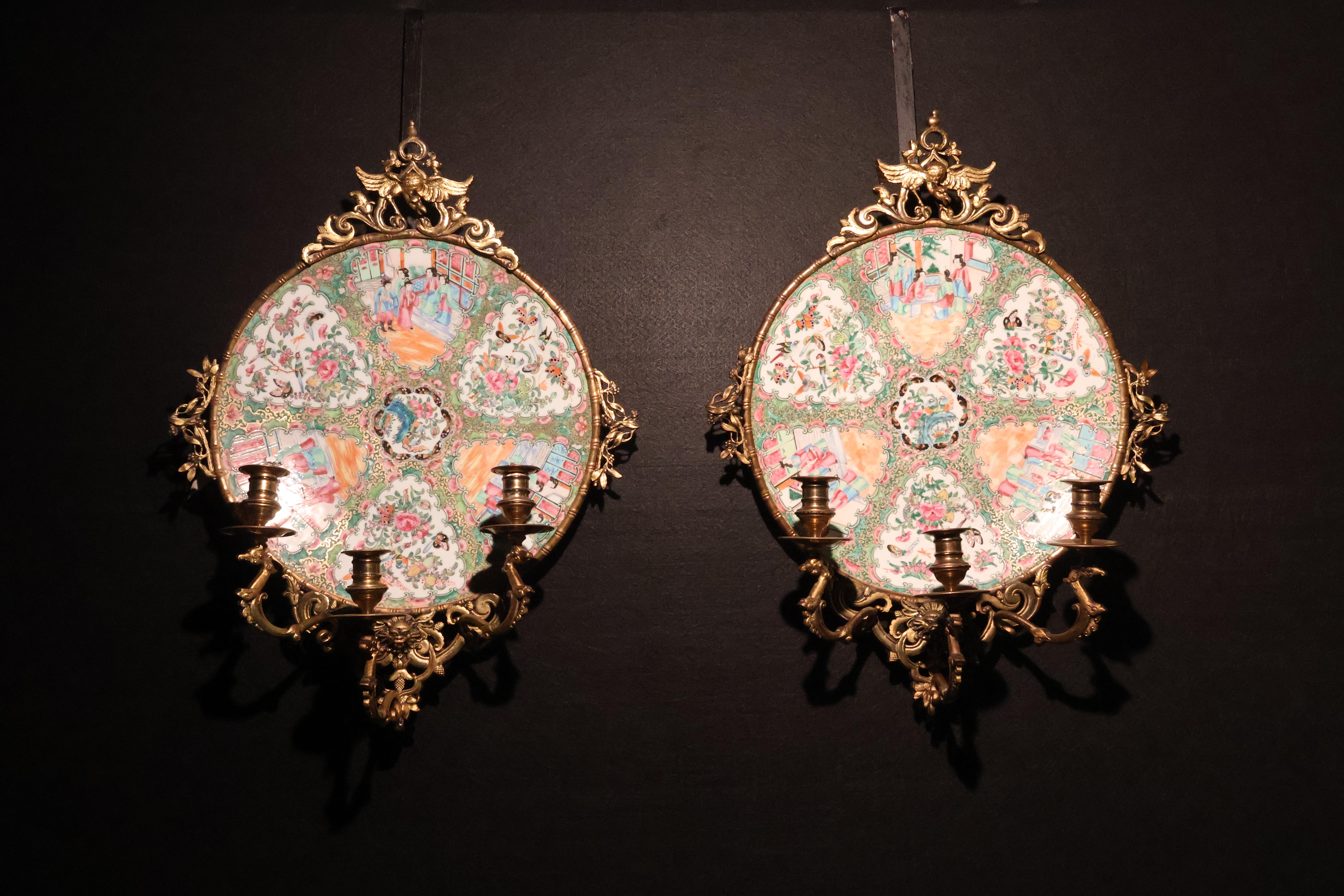 A Exceptional Pair of Famille Rose Canton Plates, now turned into wall sconces.  For Sale 1