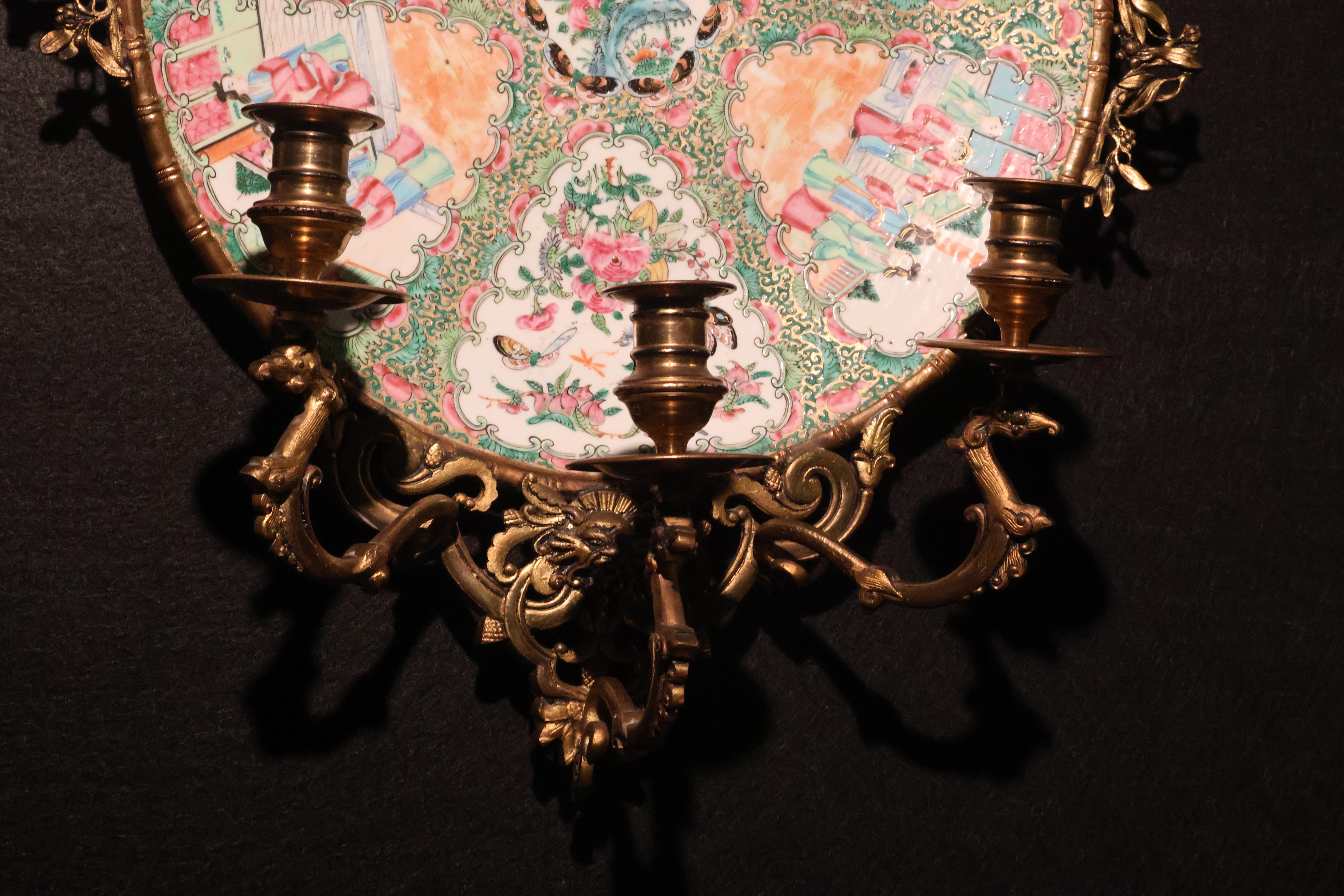 A Exceptional Pair of Famille Rose Canton Plates, now turned into wall sconces.  For Sale 2