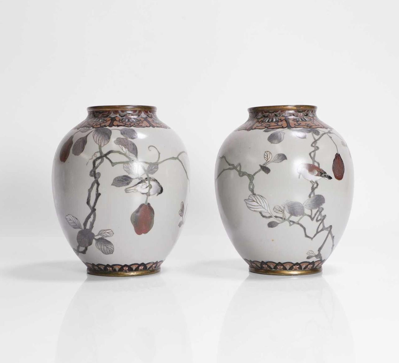 A Exceptional Pair of Japanese Cloisonné Vases in the Manner of Namikawa Sōsuke

Meiji period. 
A superb pair of Japanese silver-wire cloisonné enamel vases in the manner of Namikawa Sōsuke. 
In baluster shape finely worked in silver wire and