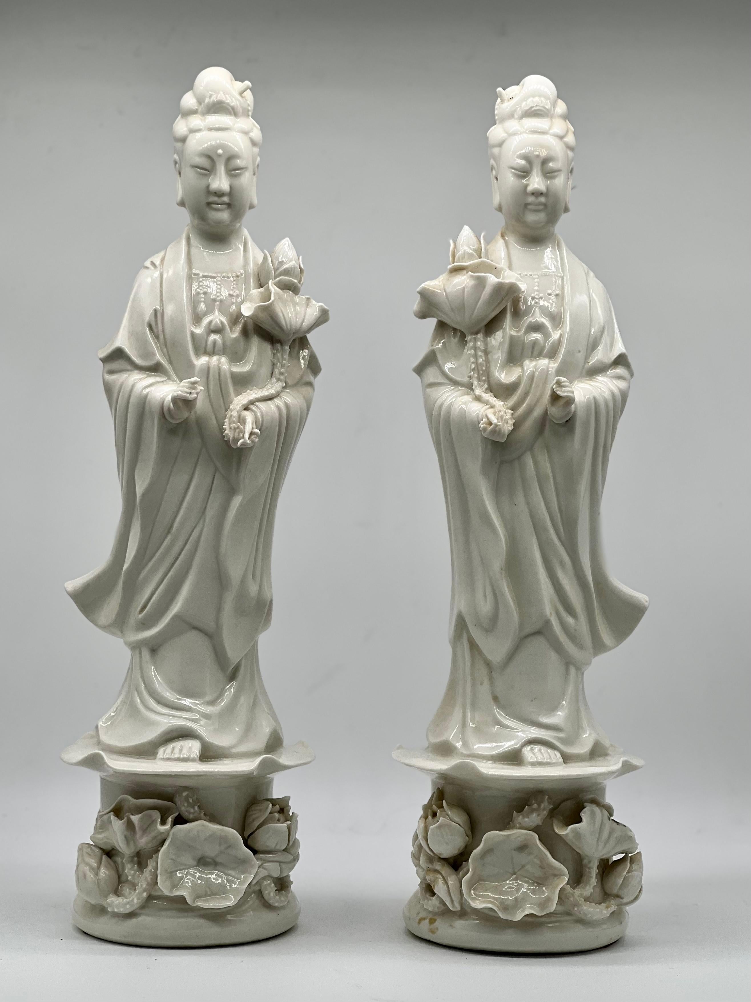 A Exquisite and large pair of blanc de Chine Statues of Guanyin. Republic period of China. 

Chinese Blanc de Chine statues of 
Guan Yin 
Republic period of China. 

The goddesses are dressed in flowing robes standing on an intricate lotus and