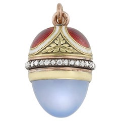 A Fabergé gold, enamel and chalcedony egg pendant