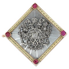 A Fabergé Ruby, Enamel, Gold And Diamond Brooch