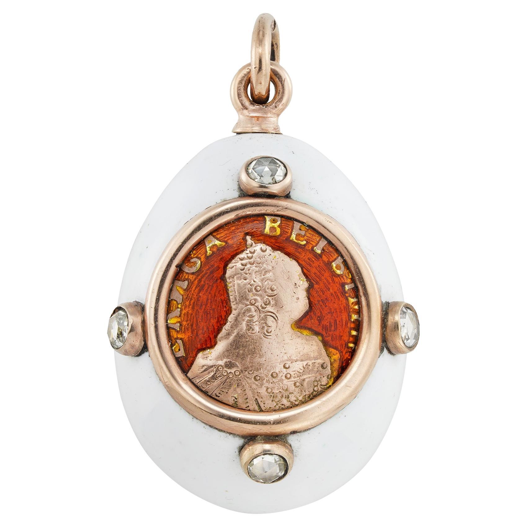 A Fabergé White And Red Enamelled Easter Egg Pendant For Sale