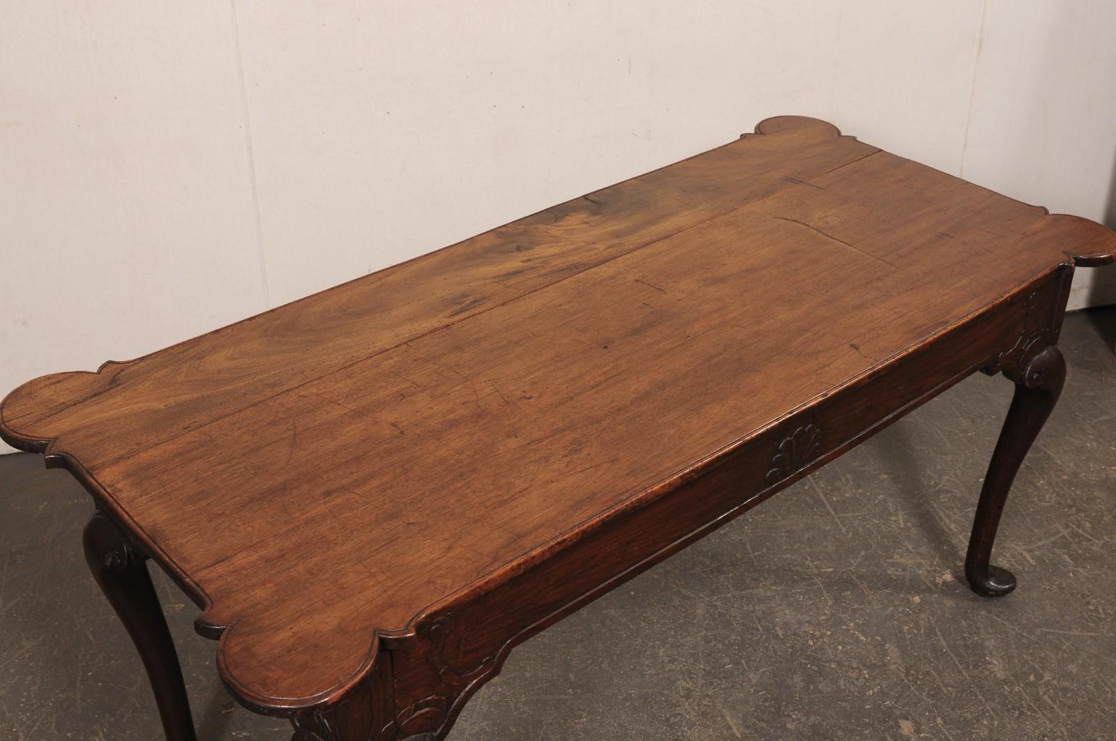 A Fabulous 18th C. Portuguese Walnut Console or Library Table (All Sides Carved) For Sale 1