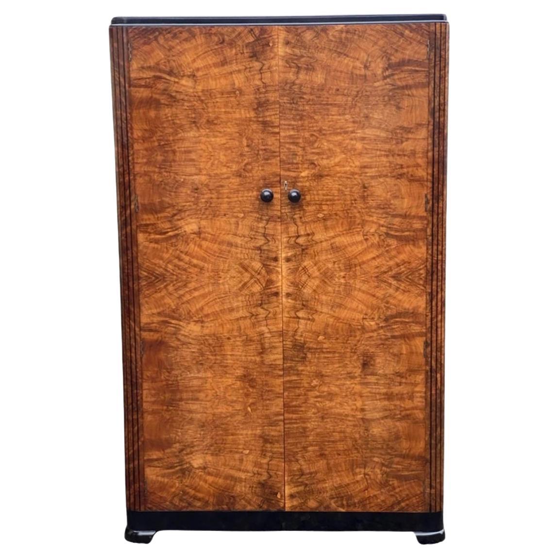 A fabulous 1930’s Art Deco Period Wardrobe with Bookpaged Oyster Veneers For Sale