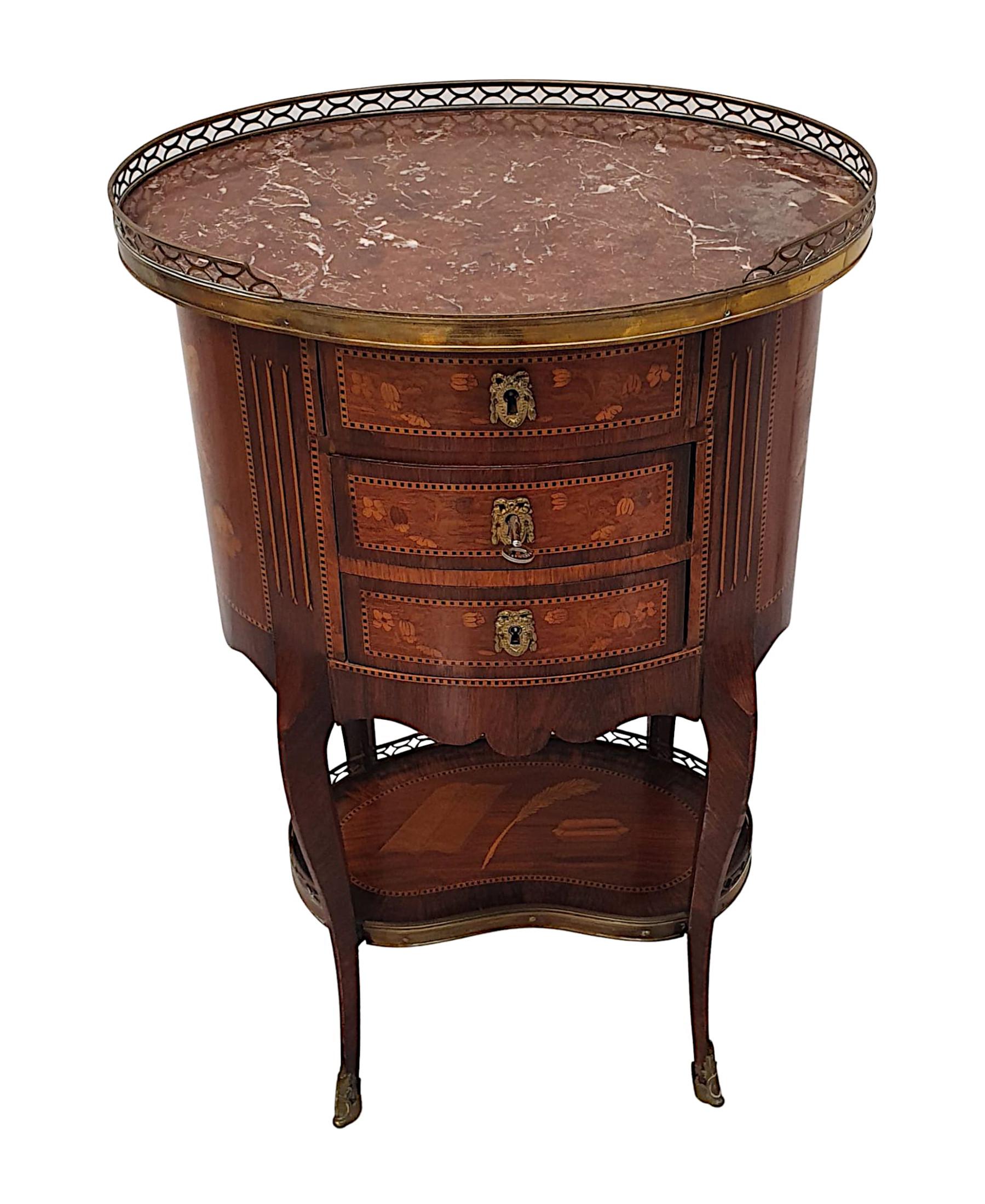 A fabulous 19th century cabinet of oval form, stunningly hand carved and with lovely patinated timbers comprising of mahogany, kingwood and fruitwood. Ormolu mounted and intricately inlaid with exquisite marquetry panels throughout, depicting