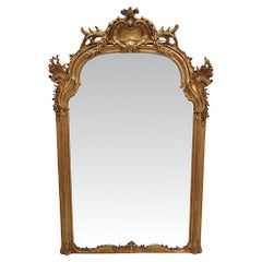 Fabuleux grand miroir de hall ou de trumeau en bois doré du XIXe siècle