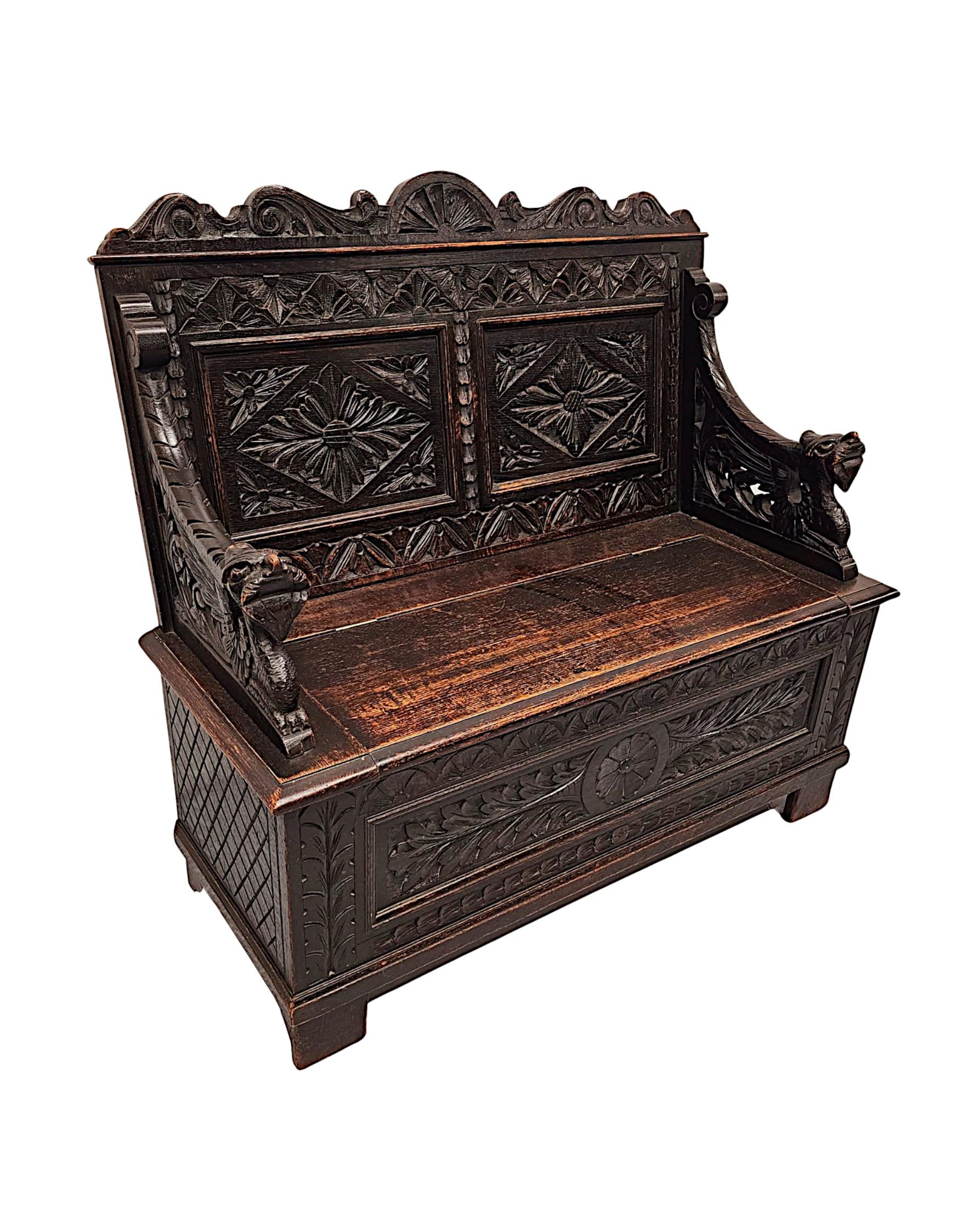 A fabulous 19th Century well figured, oak monks bench of exceptional quality, finely hand carved with rich patination, grain and profusely decorated with carved detail throughout.  The shaped and moulded twin panelled back with geometric and foliate