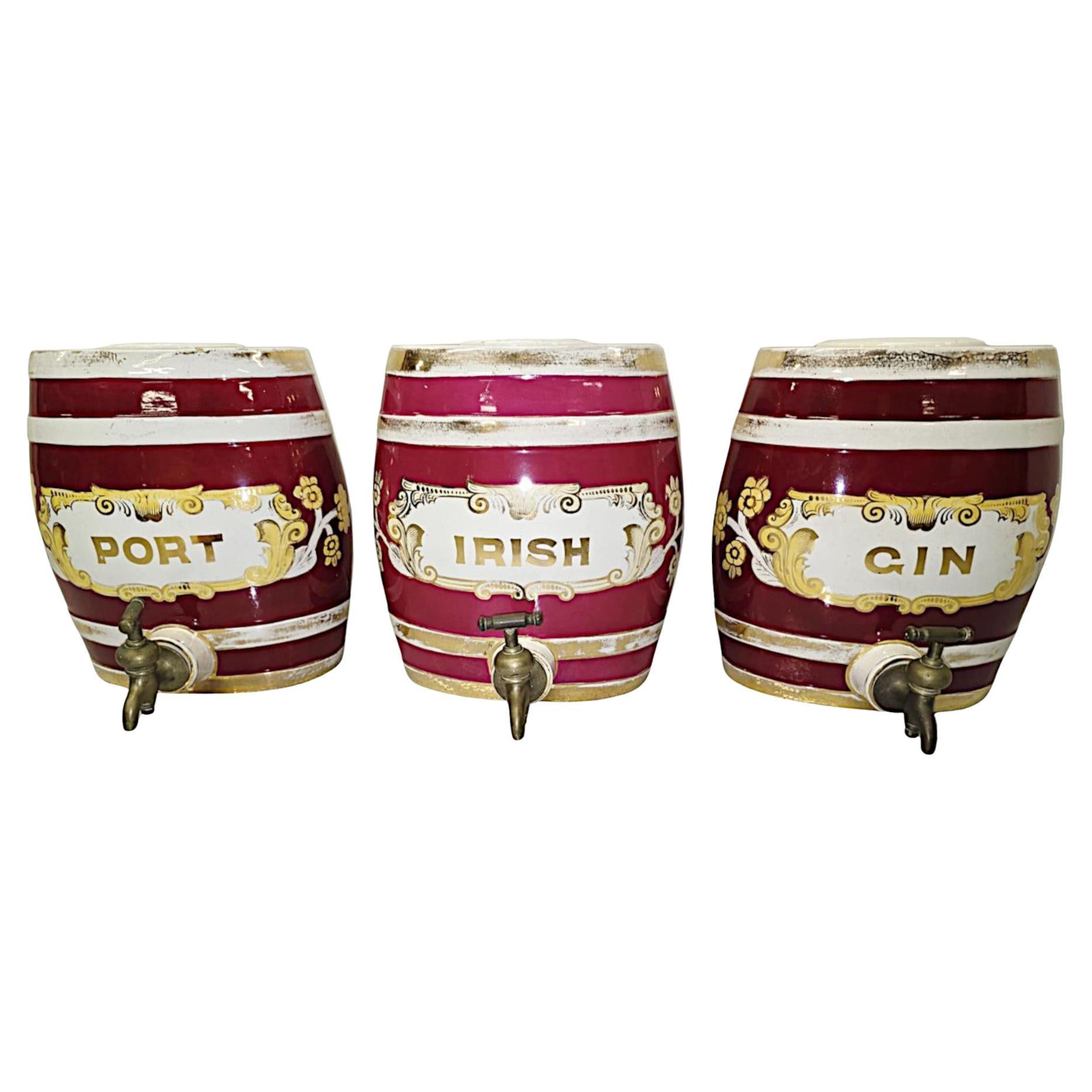 A Fabulous 19th Century Set of Three Porcelain Drinks Kegs with Brass Taps For Sale