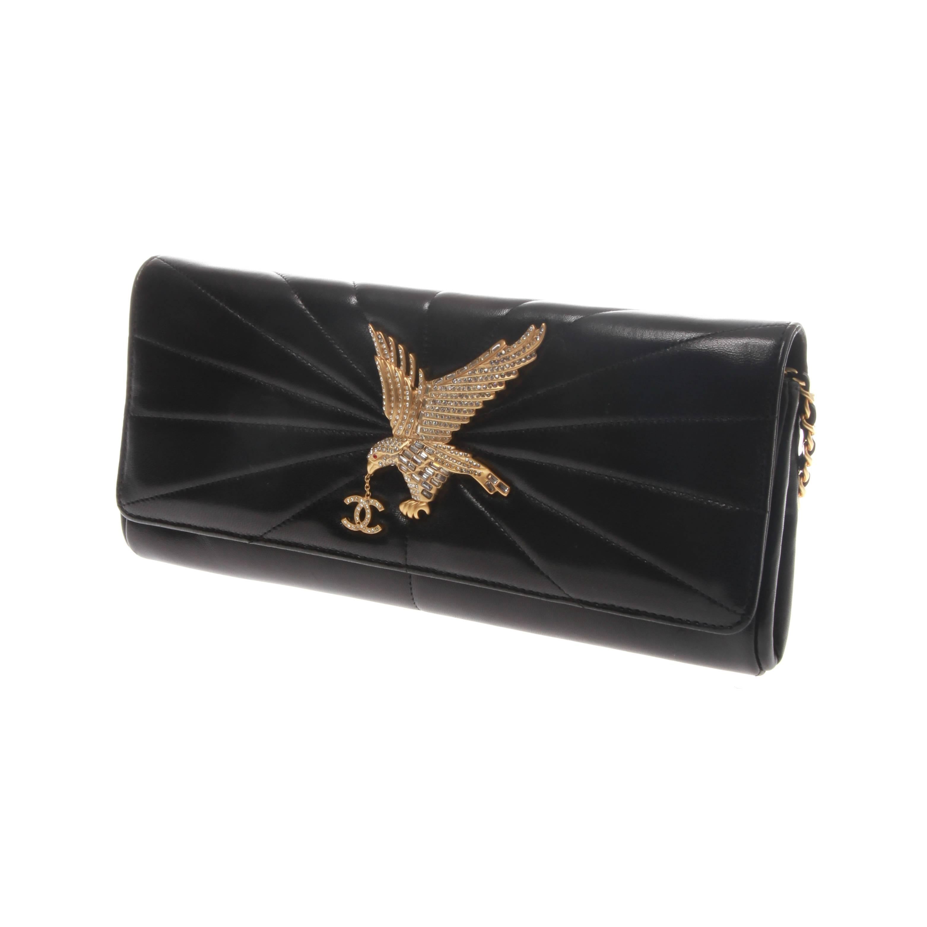 Chanel quilted black leather clutch with gold-tone hardware