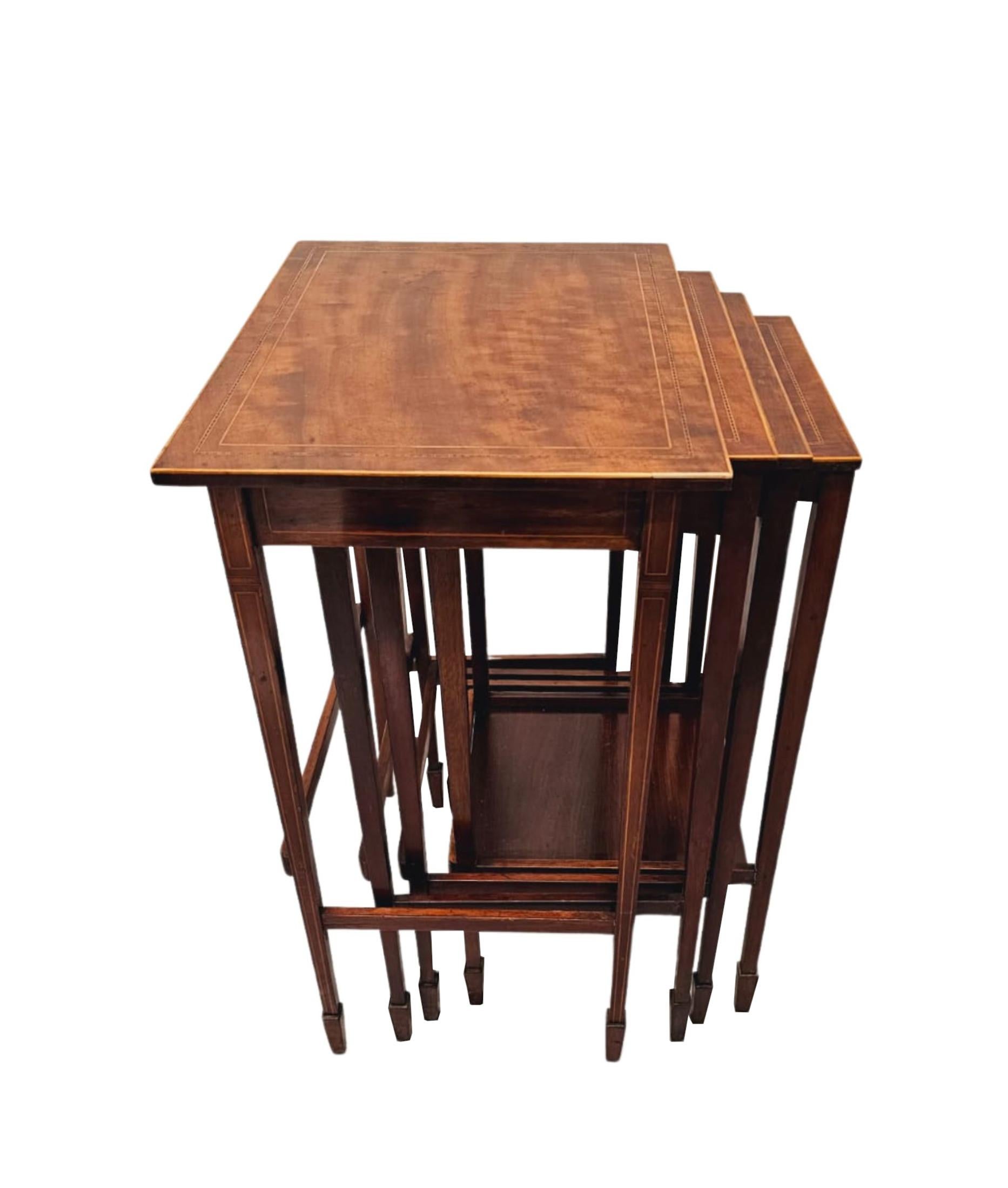 English Edwardian Inlaid Mahogany Nest of Four Tables For Sale