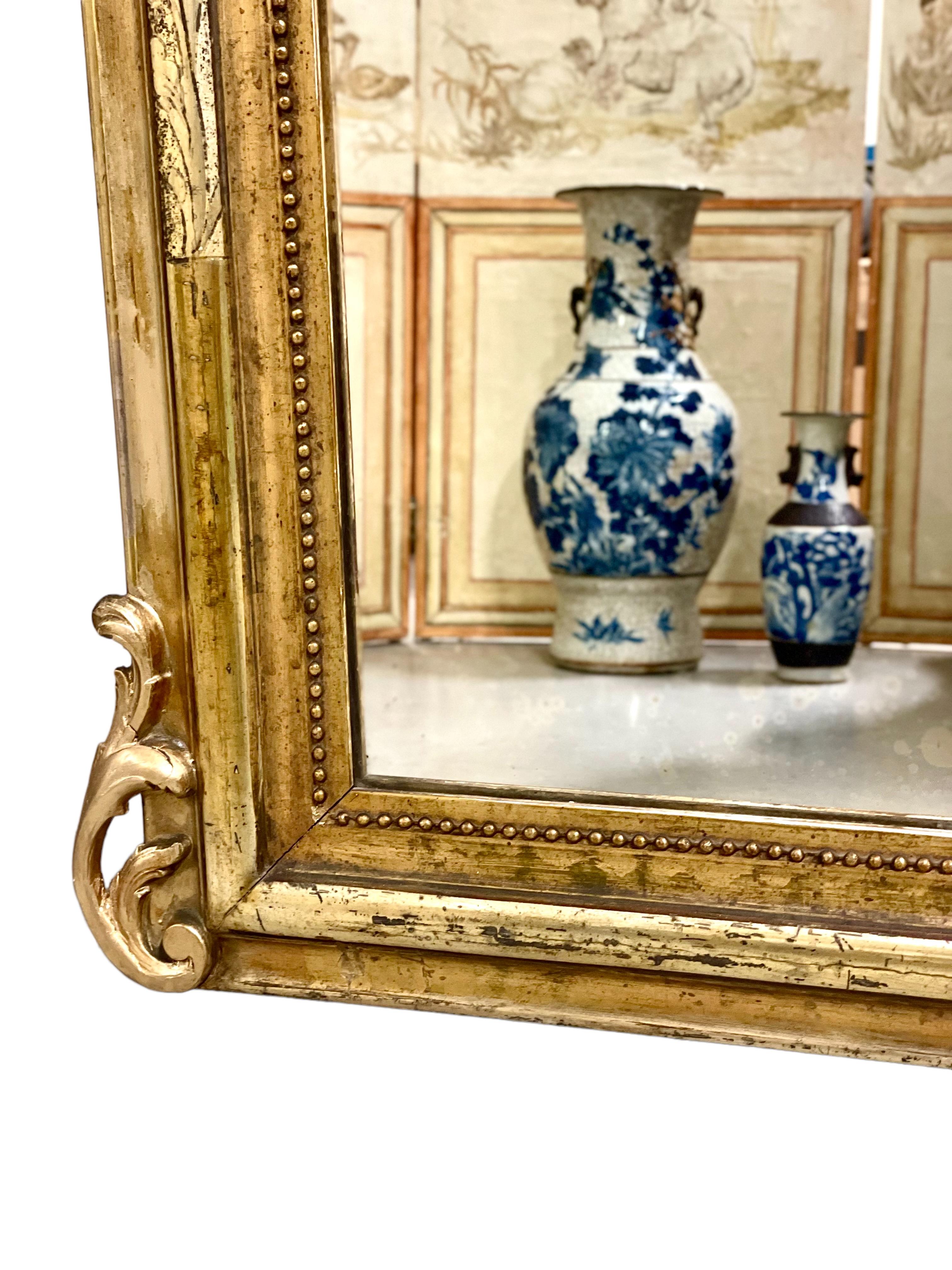XIXe siècle Miroir en bois doré Louis Philippe 1840  en vente