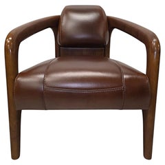 A Fabulous Mid Century Design Walnut and Leather Armchair