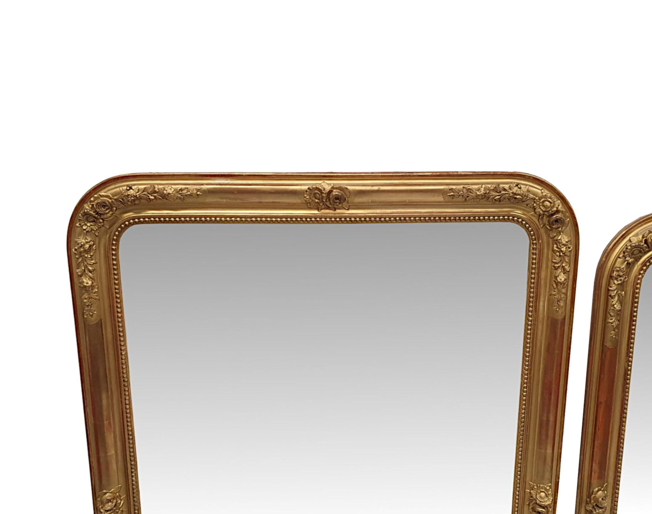 Glass A Fabulous Near Pair of 19th Century Giltwood Overmantle Mirrors For Sale