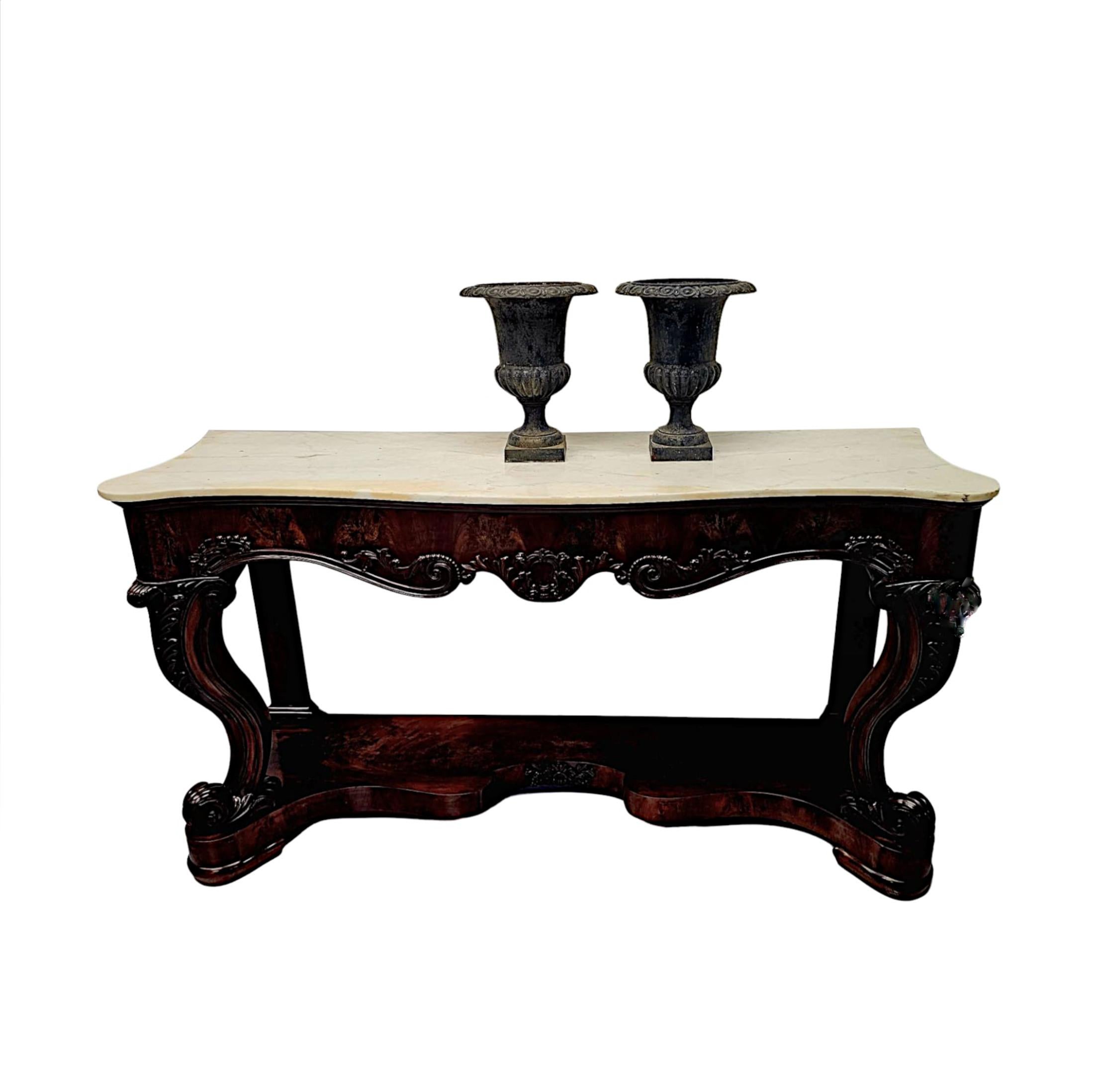 A fabulous heavy pair of 19th Century beautifully patinated and finely cast iron garden urns of exceptional quality and large proportions.  The urns of circular form with gorgeous egg and dart motif detail to everted rim and fluted detail to the