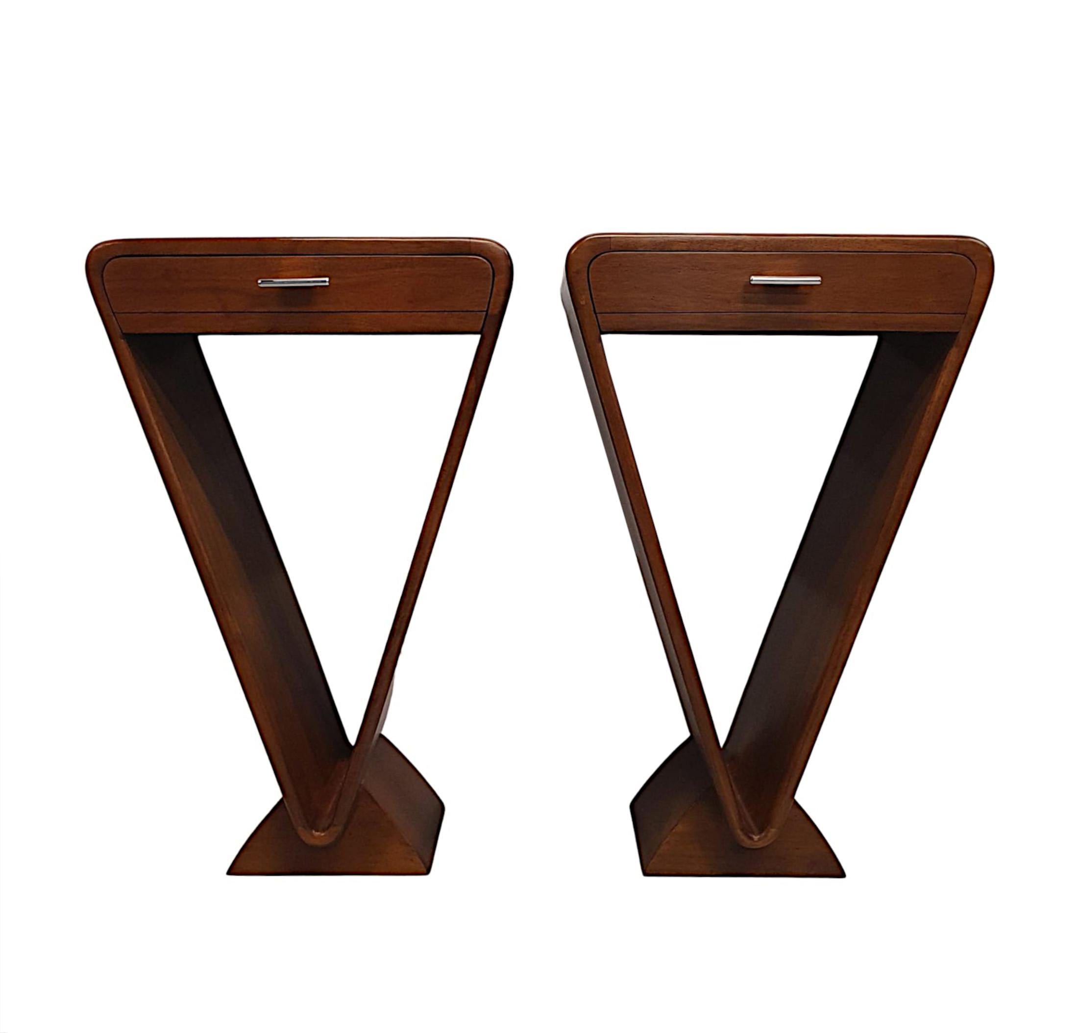 A fabulous contemporary pair of cherrywood bedside or side tables in the Art Deco style, of gorgeous quality with a clean curvilinear design and superb patination to the wood. The moulded curved top raised over single drawer frieze above a
