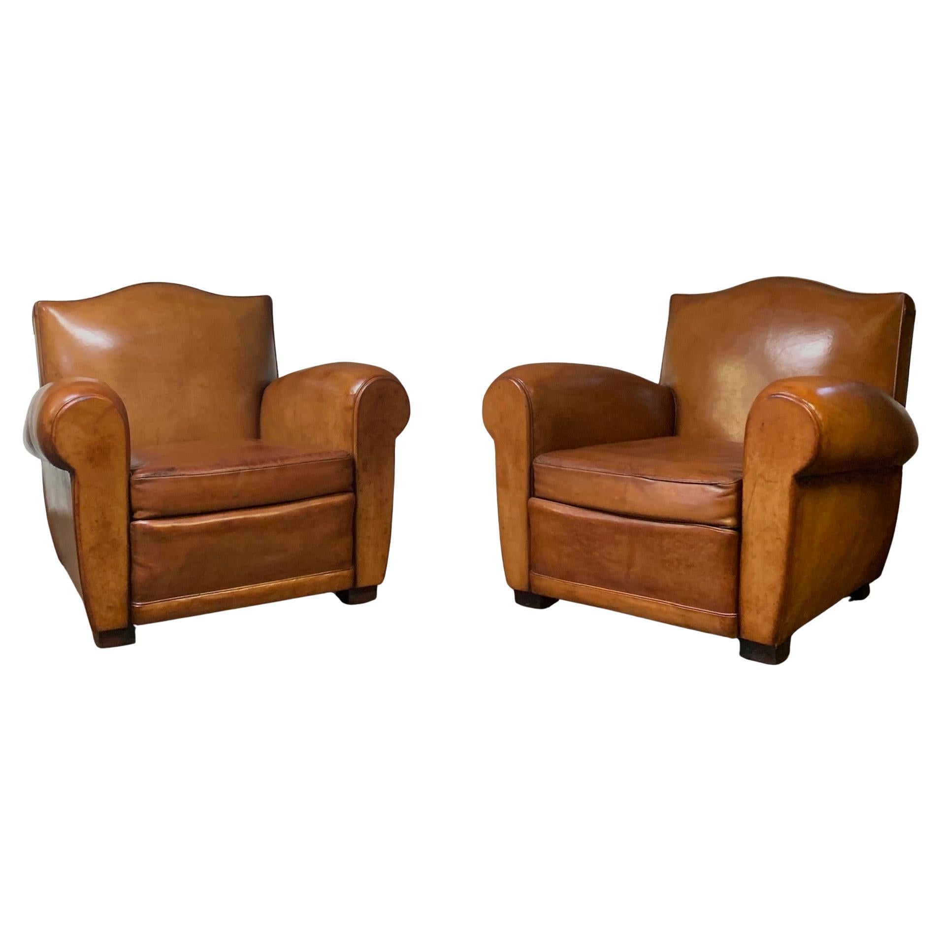 A Fabulous Pair of French Leather Club Chairs Chapeau de Gendarme Models C 1950